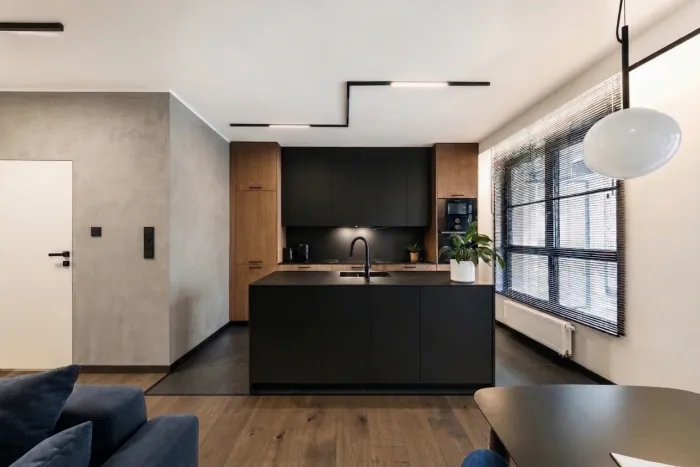 Step 2: the large left wall and its outside corner in warm grey microcement